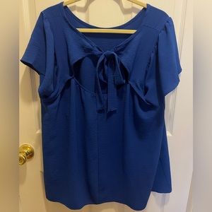 Blue cutout with bow in back blouse